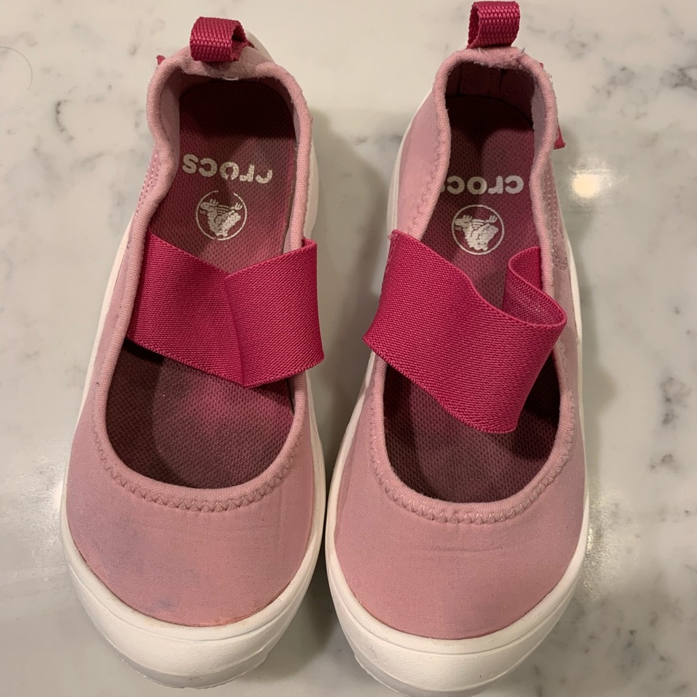 Pink crocs water shoes